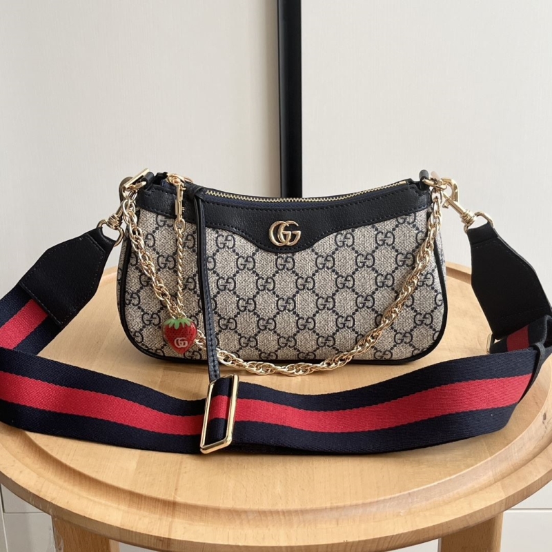 G*u*i top handle bags